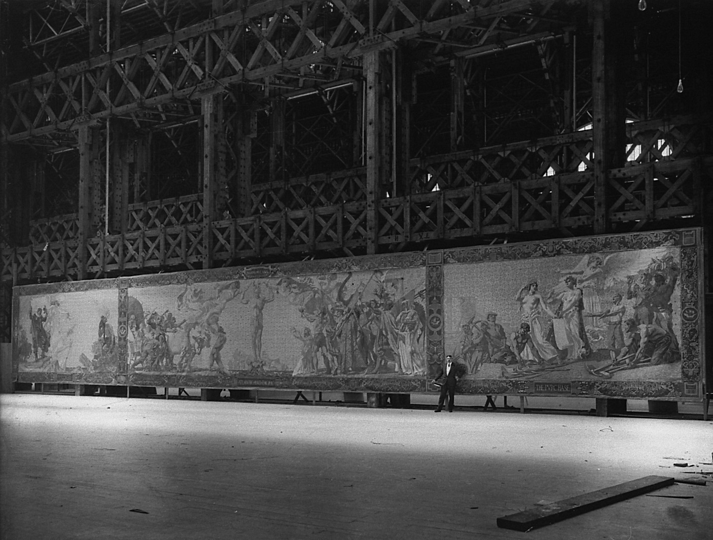 William de Leftwich Dodge with half of his 200-foot mural for the arch of the Tower of Jewels
