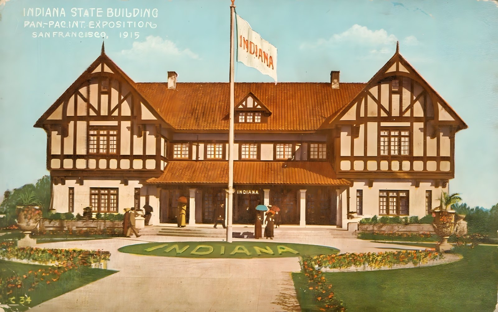 Indiana Building with an 'INDIANA' flower bed, postcard