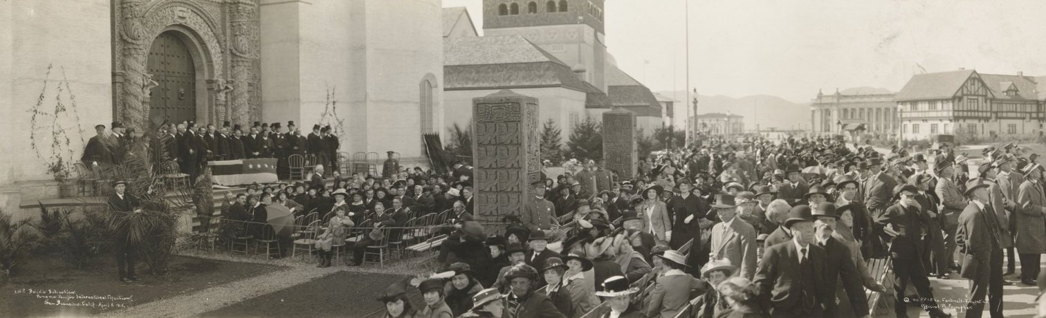 A group in front of the Bolivian Pavilion