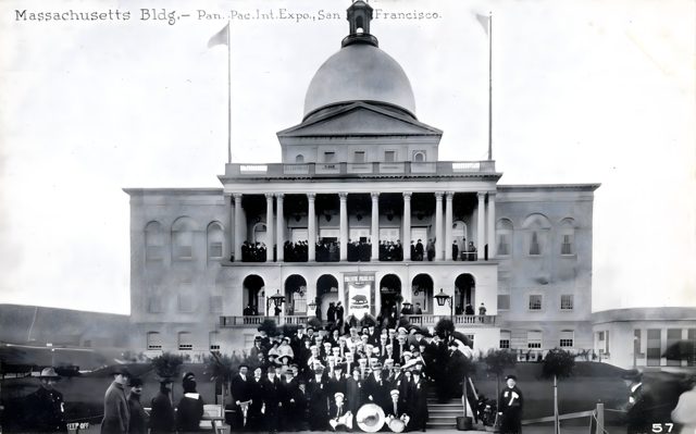 The Massachusetts Building, with a band, on a postcard