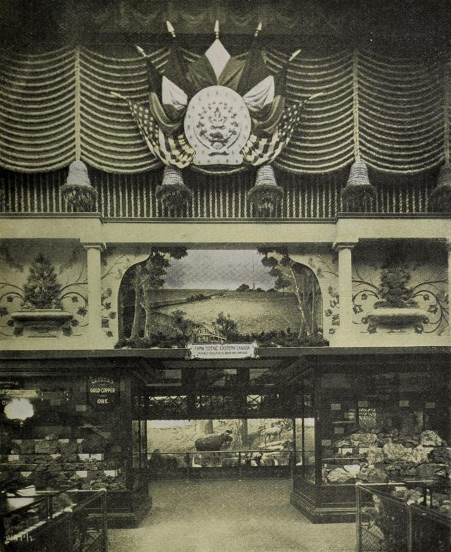 Inside the Canadian Pavilion: the "Farm Scene, Eastern Canada" diorama above cases of ore specimens