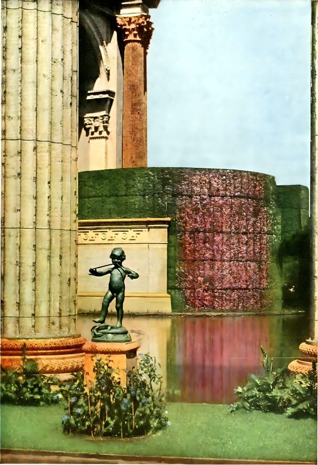 A small bronze figure by the colonnade of the Palace of Fine Arts, in color