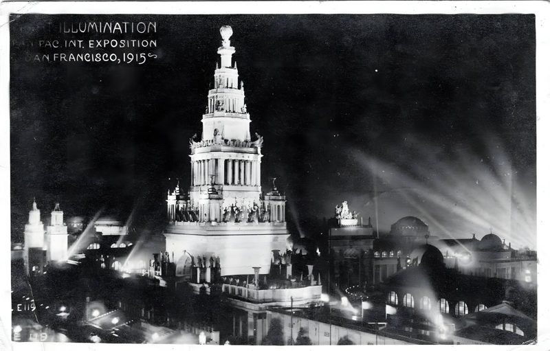 The Tower of Jewels lit at night, on a postcard