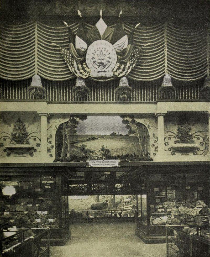 Inside the Canadian Pavilion: the "Farm Scene, Eastern Canada" diorama above cases of ore specimens