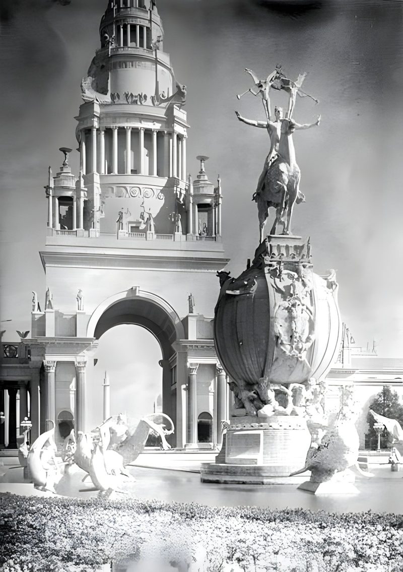The tower rising behind Calder's Fountain of Energy